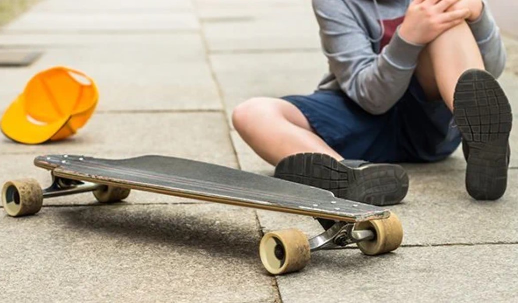 Photo égratignures genoux enfant