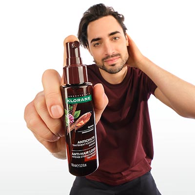 Application du traitement Quinine de Klorane