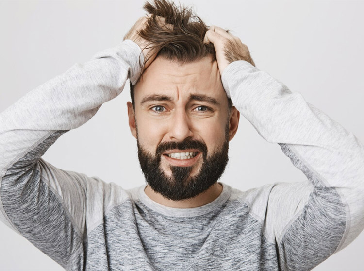 Démangeaisons cheveux pellicules